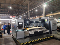 //rkrorwxhnpmilr5p.ldycdn.com/cloud/pjBpiKrqlrSRqlklkqkkkq/Cardboard-box-machinery-being-commissioned-at-the-client-s-factory.jpg